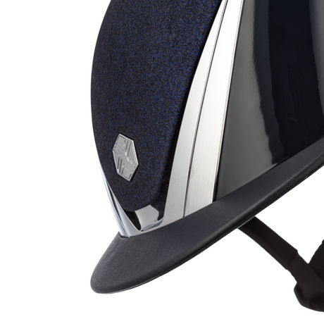 Charles Owen Hyda Sparkly riding hat in Navy Gloss/Chrome, angled close-up of the sparkly top, chrome trim and peak